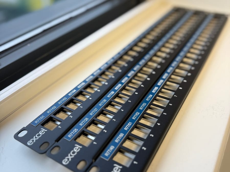Excel patch panels with printed port labels ready to install