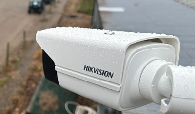 Hikvision CCTV camera installed overlooking a site entrance
