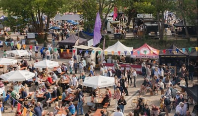 Crowds, food stalls and seating at the Aldeburgh Food & Drink Festival