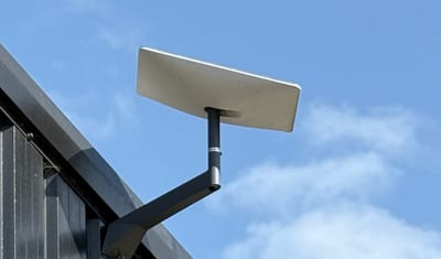 Starlink dish installed on a barn by EA Data
