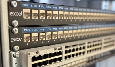 Excel Cat6A patch panels and a Cisco switch installed by EA Data